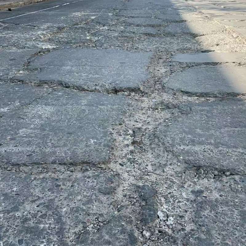 南郊路面起砂露石子修补料
